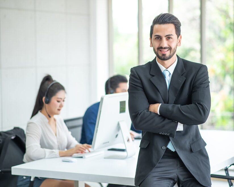 Boss or manager stand and happy ,background customer service or telemarketing.